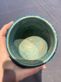 A fine Raqqa turquoise-glazed striped jar, Syria, 13th C.