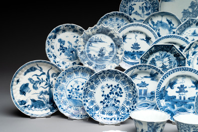 A massive collection of 32 Chinese blue and white cups and 30 saucers, Kangxi/Qianlong