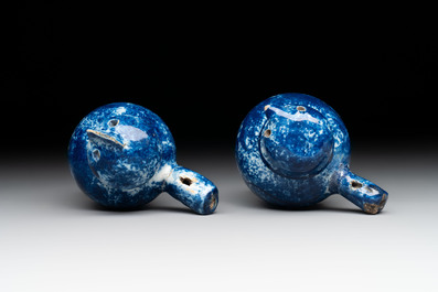 A pair of blue and white Dutch Delft 'bird' whistles, 18th C.