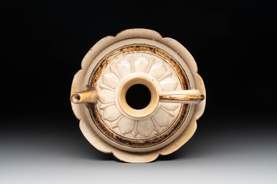 An Annamese or Vietnamese brown-glazed cream-ground 'lotus' ewer, 14th C.