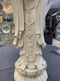A large Chinese Dehua blanc de Chine figure of Guanyin holding a ruyi, He Chaozong 何朝宗 and Dehua 德化 mark, 20th C.