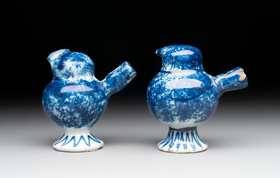 A pair of blue and white Dutch Delft 'bird' whistles, 18th C.