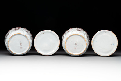 A pair of polychrome Dutch Delft fluting-children-topped butter tubs and covers, 18th C.