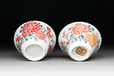 Two Chinese famille rose 'birds on flowering branches' cups and saucers, Yongzheng