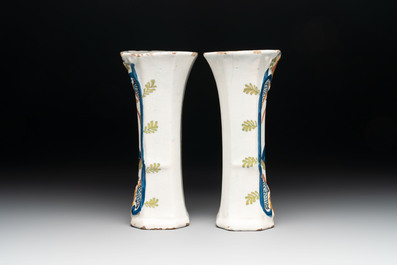 A polychrome Dutch Delft garniture of five vases with the portrait of William I of The Netherlands, early 19th C.