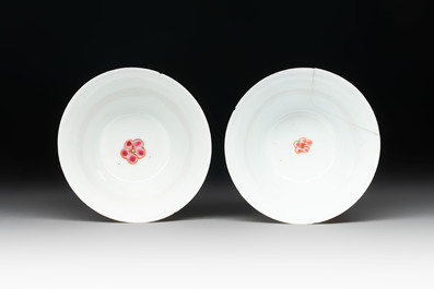 Two Chinese famille rose 'birds on flowering branches' cups and saucers, Yongzheng
