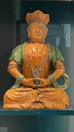 A large Chinese sancai-glazed Buddha, possibly from the Chengde Palace, Qianlong