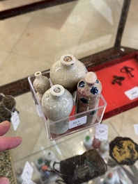 Three Chinese ge-type snuff bottles and a blue, white and ge-type snuff bottle, 19th C.