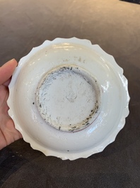 Four Chinese white-glazed saucers and three bowls, Yuan/Ming