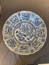 A large Chinese blue and white 'kraak' dish with birds among flowering branches, Wanli