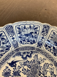 A large Chinese blue and white 'kraak' dish with birds among flowering branches, Wanli