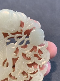 Two Chinese white and celadon jade 'crane' and 'deity' plaques, Qing
