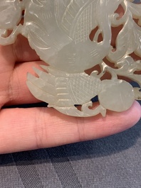 Two Chinese white and celadon jade 'crane' and 'deity' plaques, Qing