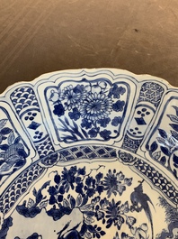 A large Chinese blue and white 'kraak' dish with birds among flowering branches, Wanli