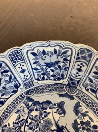 A large Chinese blue and white 'kraak' dish with birds among flowering branches, Wanli