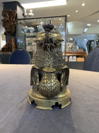 A brass griffin-form aquamanile, Germany, 19th C.