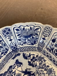 A large Chinese blue and white 'kraak' dish with birds among flowering branches, Wanli