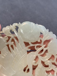 Two Chinese white and celadon jade 'crane' and 'deity' plaques, Qing