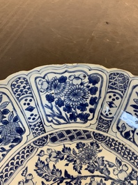 A large Chinese blue and white 'kraak' dish with birds among flowering branches, Wanli
