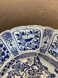 A large Chinese blue and white 'kraak' dish with birds among flowering branches, Wanli