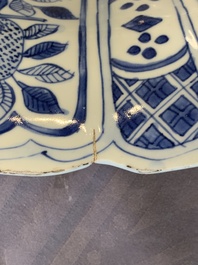 A large Chinese blue and white 'kraak' dish with birds among flowering branches, Wanli