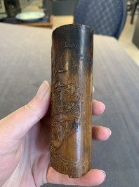 Two Chinese carved bamboo brush pots and an ink stone with wooden cover and stand, signed He Xuanting 何選廷 and Dian Liangbi 典良弼, 19th C.
