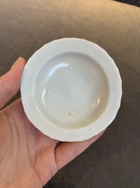 Four Chinese white-glazed saucers and three bowls, Yuan/Ming