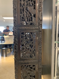 A richly carved Chinese hongmu display cabinet, Canton, 19th C.