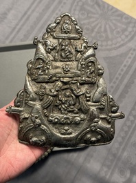 Four Tibetan bronze and wooden phurbas, a 'kapala' or skull-bowl and two silver ornaments, 19th C.