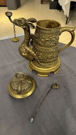 A brass griffin-form aquamanile, Germany, 19th C.