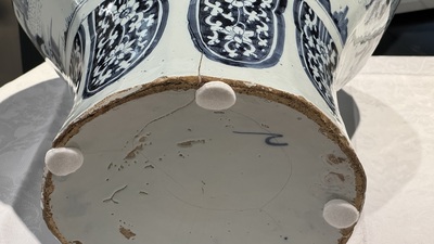 A large blue and white Dutch Delft chinoiserie vase and cover, late 17th C.