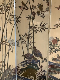 A Chinese polychrome lacquered wooden eight-panel folding screen with a pond scene, 19/20th C.