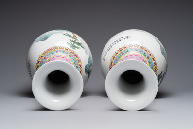 A pair of Chinese famille rose 'riverscape' vases, Qianlong mark, 20th C.