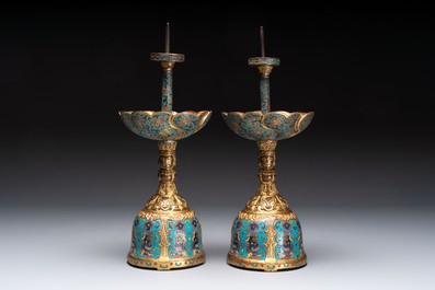 A pair of Chinese cloisonn&eacute; candle holders, 19th C.