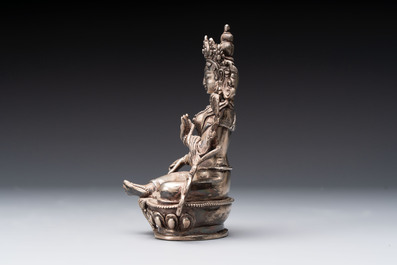 A Tibetan gilt-bronze Tara and a silver Tara, 19/20th C.