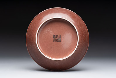 A Chinese aubergine-glazed 'dragon' plate, Jiaqing mark, 19/20th C.
