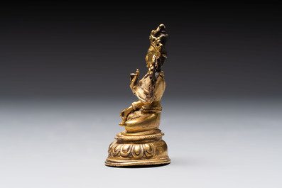 A Tibetan gilt-bronze Tara and a silver Tara, 19/20th C.