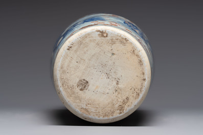 A Chinese gilt and iron-red decorated blue and white rouleau vase with figural design, 19/20th C.