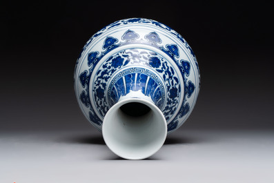 A Chinese blue and white 'flower scroll' bottle vase, Xuantong mark, 20th C.