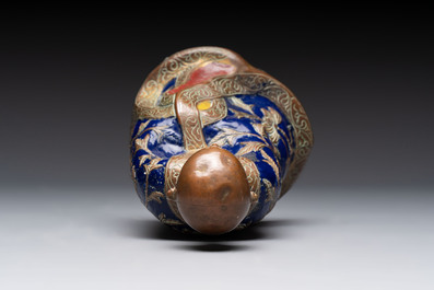 A Chinese champlev&eacute; figure of Luohan, Qianlong mark, 18/19th C.