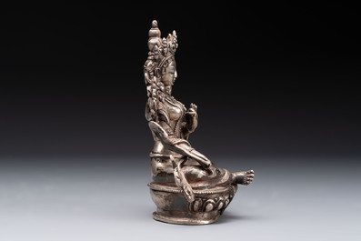 A Tibetan gilt-bronze Tara and a silver Tara, 19/20th C.