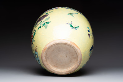 A Chinese yellow-ground famille rose 'pheasant and peony' scroll bowl, 19th C.