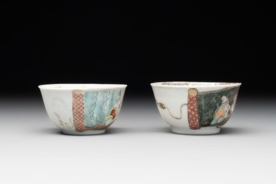 A pair of rare Chinese rose-grisaille cups and saucers after 'Actors of the Com&eacute;die-Fran&ccedil;aise' by Watteau, Yongzheng/Qianlong