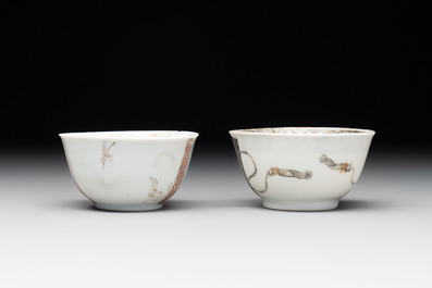 A pair of rare Chinese rose-grisaille cups and saucers after 'Actors of the Com&eacute;die-Fran&ccedil;aise' by Watteau, Yongzheng/Qianlong