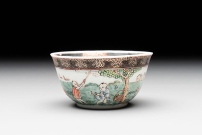A fine Chinese famille rose 'apple pickers' cup and saucer, Yongzheng