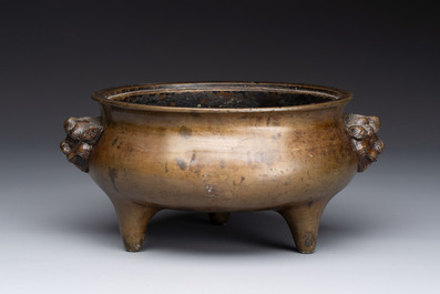 Two Chinese bronze censers with lion-form handles, Zi Sun Bao Zhi 子孫保之 mark, 19th C.