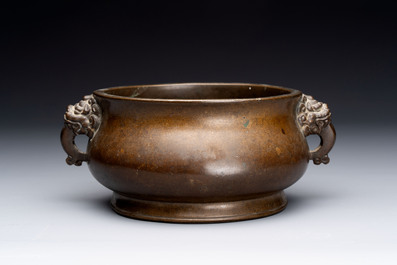 Two Chinese bronze censers with lion-form handles, Zi Sun Bao Zhi 子孫保之 mark, 19th C.