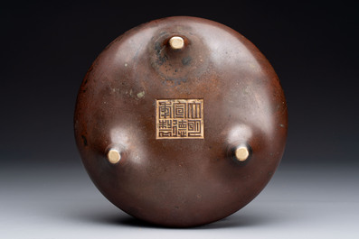 A Chinese bronze tripod censer, Xuande mark, 17/18th C.