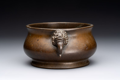 Two Chinese bronze censers with lion-form handles, Zi Sun Bao Zhi 子孫保之 mark, 19th C.