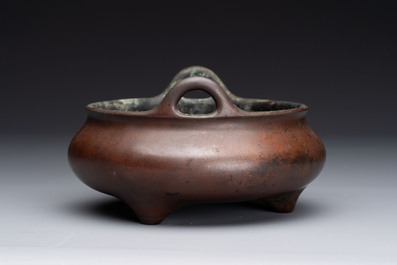 A Chinese bronze tripod censer, Xuande mark, 17/18th C.